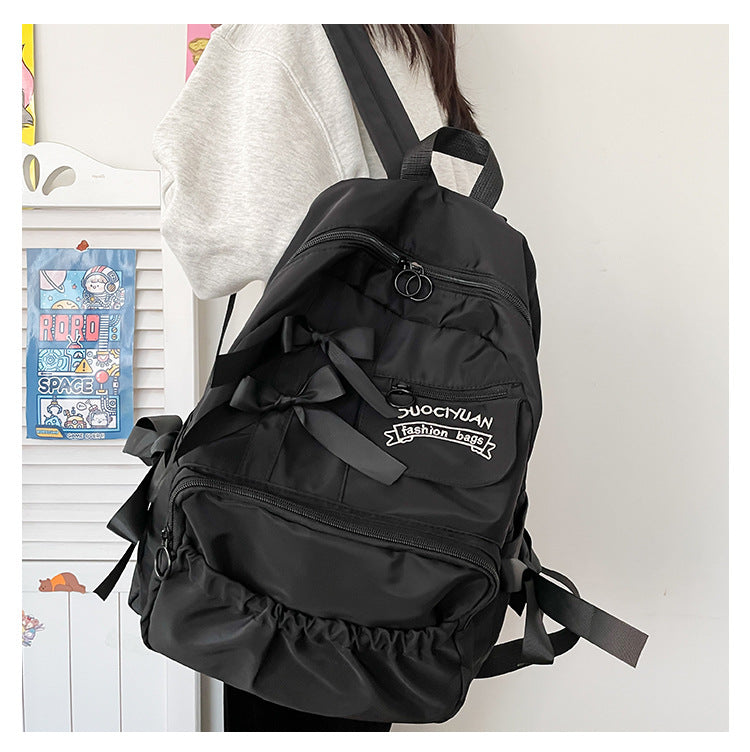 Women's Black Bow Accent Nylon Backpack Large Capacity School Travel Daypack